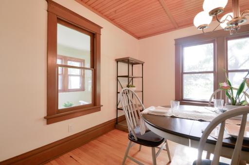 Character-filled structure with natural woodwork throughout, wood ceilings in the living and dining rooms