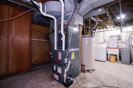 Updates include a new propane forced-air furnace, central air conditioning, and smart thermostat (2023), new well pressure tank and water softener/filtration system (2021)