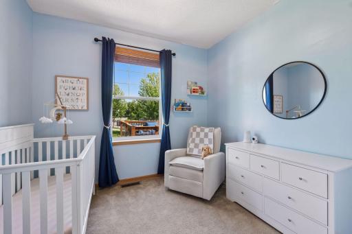 A versatile upper-level bedroom ideally positioned near the primary bedroom.