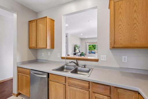 An open layout keeps the kitchen connected to dining, entertaining, and outdoor living areas.