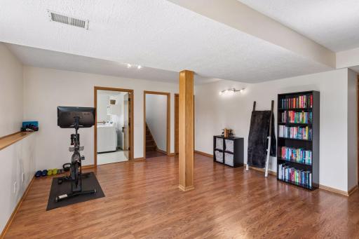 Additional lower-level flex space offers room for fitness, hobbies, work, or everyday living.