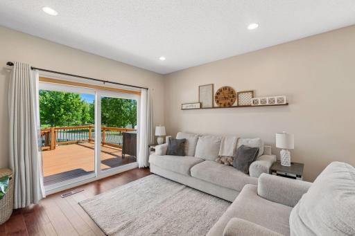 The oversized sliding glass doors allows all day sun to light up the room.
