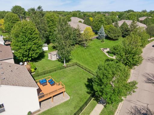 Generous outdoor space surrounded by a new aluminum lifetime fence.