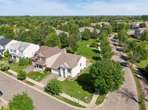 The corner-lot setting provides added privacy, open views, and extra space to enjoy.