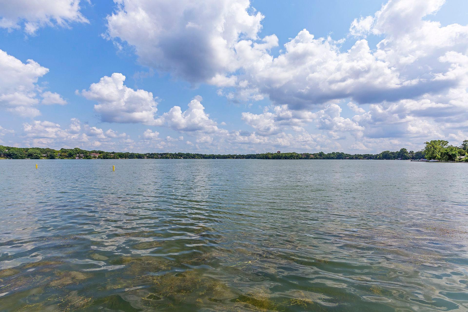Updated walking trails are accessible right by the house, creating a seamless, scenic loop all the way around the lake!