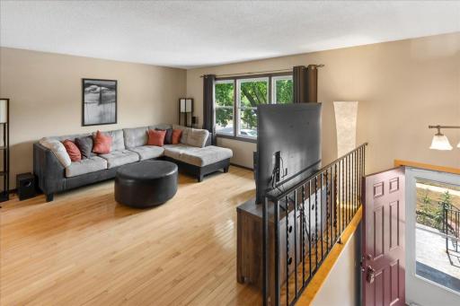 Nice size main floor living room with wood floors