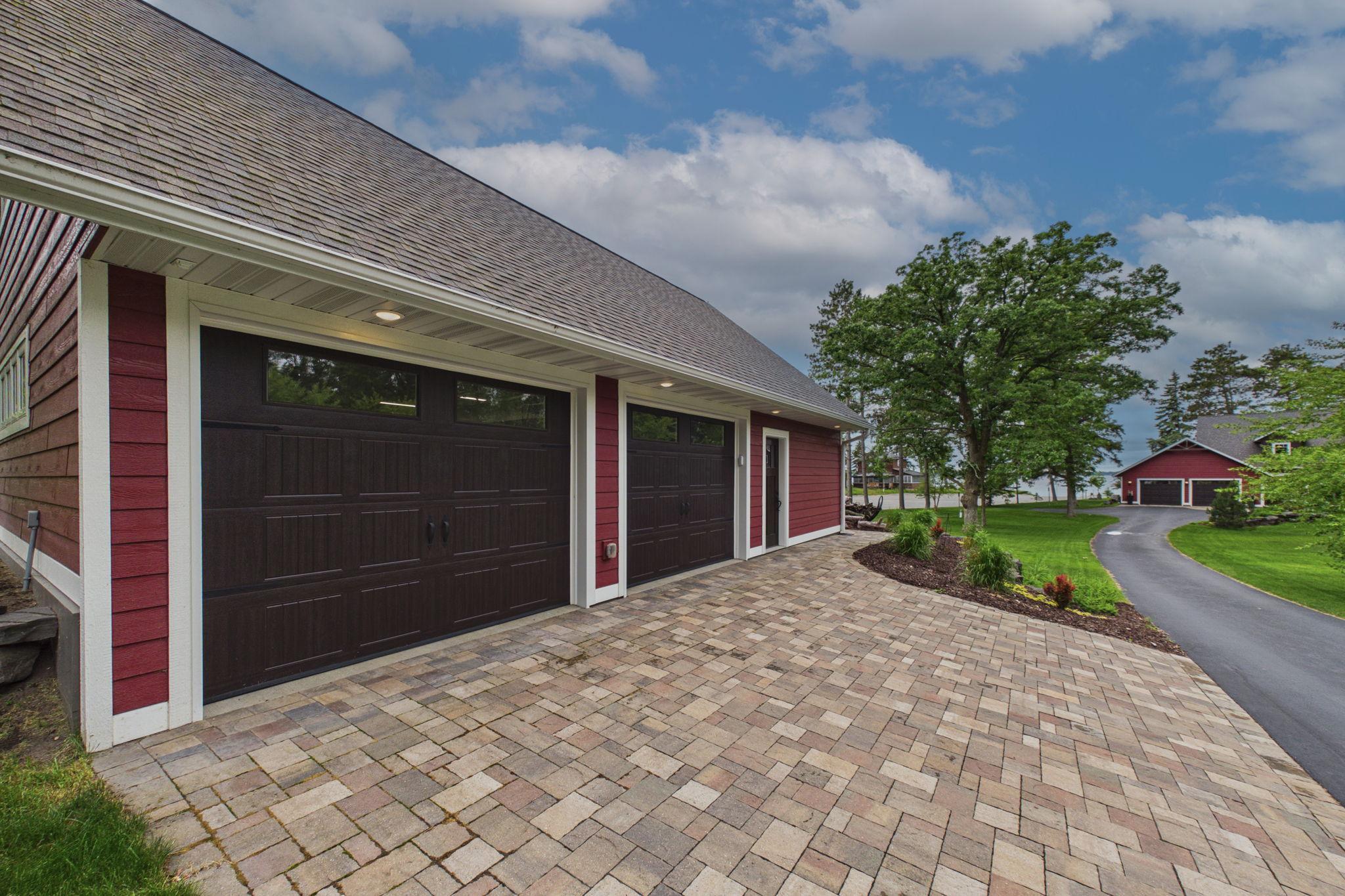Pavers line the bonus garage