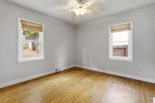 Bedroom 1 with natural light from two windows