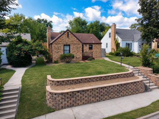 Classic brick exterior with thoughtfully updated landscaping