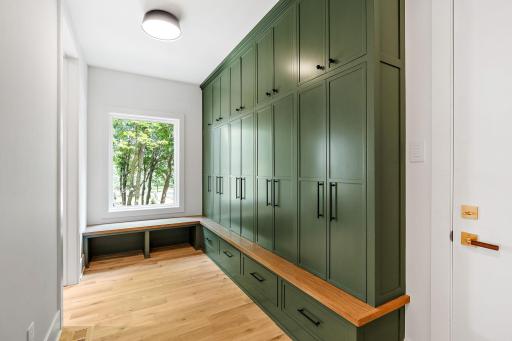 Step to the fabulous mudroom with an abundant amount of storage