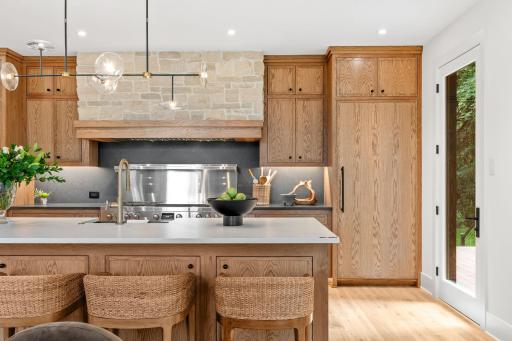 Separate refrigerator and freezer, high end appliances, and access to the deck