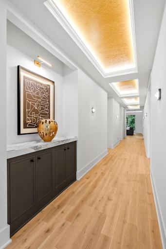 Stunning hallway to the upper level bedrooms with striking ceiling details