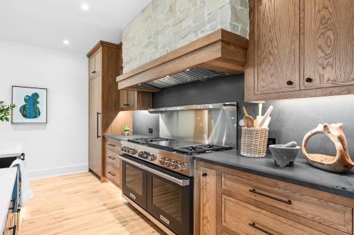 High end appliances, Cambria countertops, and white oak cabinetry