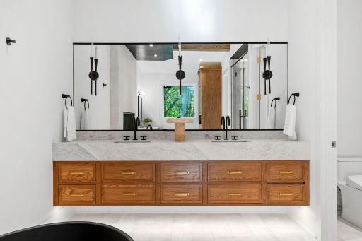 Cambria countertops, double sinks, and plenty of counter and cabinet space