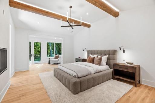 Step into the luxurious primary bedroom suite