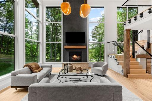 Striking Great Room with sprawling 20 foot ceilings