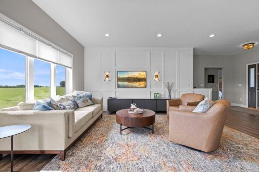 Striking board-and-batten wood accent wall, cozy but elegant spaces. Beautiful LVP floors span the entire main and lower level offering low maintenance finishes.