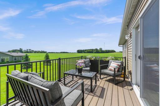 Fabulous deck retreat nestled on a quiet dead-end street, this home enjoys peaceful views overlooking open fields, offering a serene setting and a welcome sense of privacy.