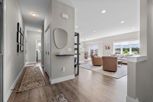 Open floor plan! Beautiful LVP flooring. White trim, Craftsman style doors. Stunning design throughout.