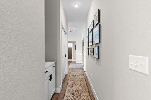 Modern colors, white trim and LVP flooring throughout.