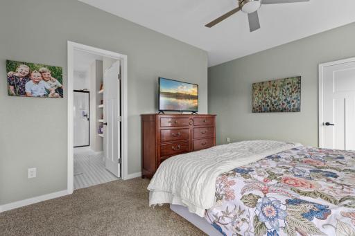 Private, primary bathroom and double walk-in closets spaces.
