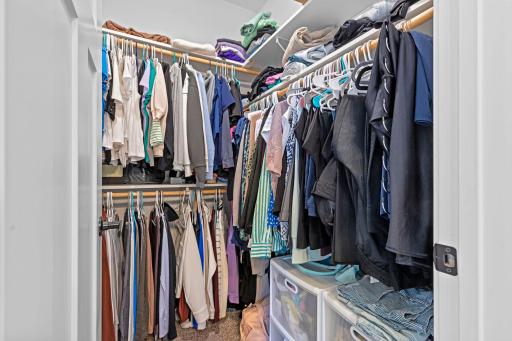 Primary offers double walk-in closet spaces.