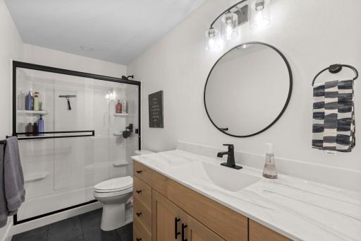 Beautifully designed 3/4 basement bathroom.