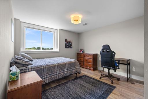 Two spacious lower level bedrooms with large, lookout windows.