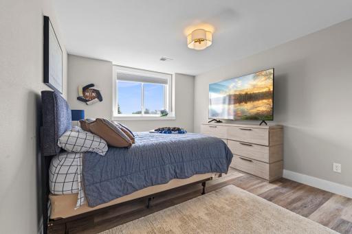 Two spacious lower level bedrooms with large, lookout windows.