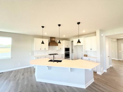 Photo from Actual Home: This kitchen is gorgeous and features the White/stained wood package!