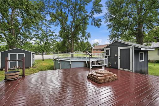 Maintenance free deck overlooking above-ground pool.