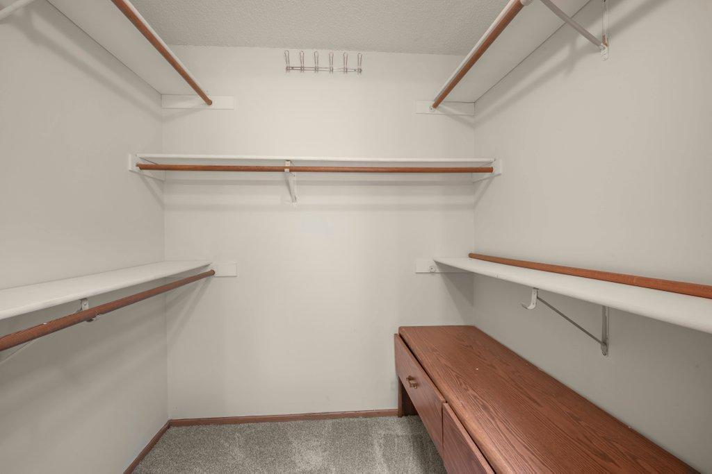 Primary Closet with Built in Drawers.