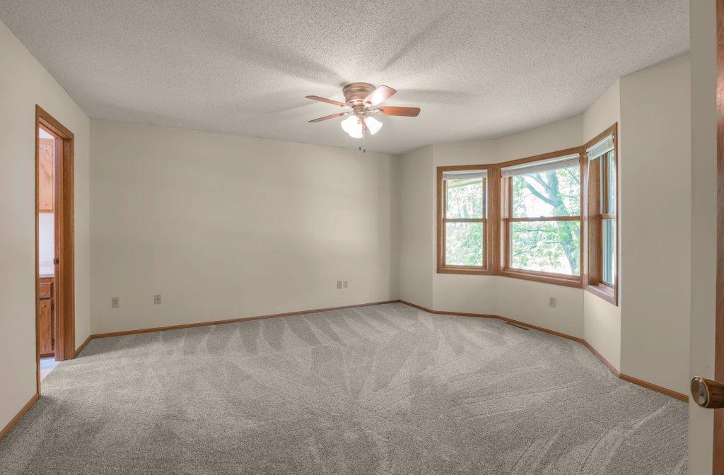 Primary Bedroom with Bay Window. All Windows in home replace in 2021.