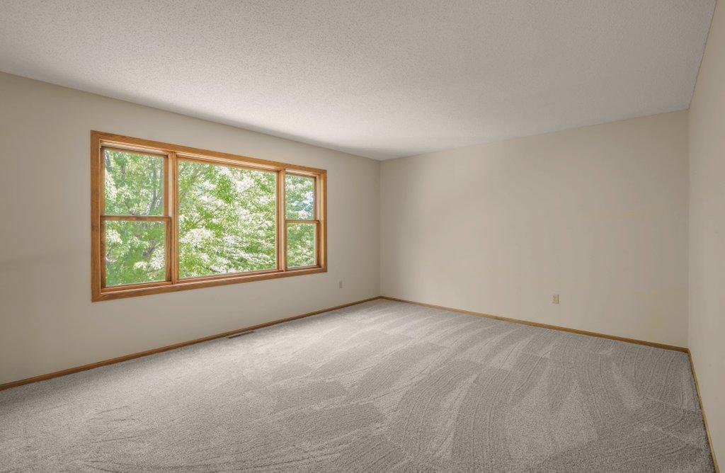 Upper Level Living Room waits for your vision.