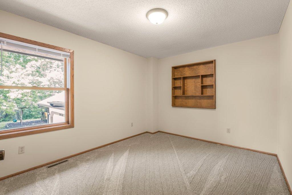 3rd bedroom with built in trophy case or any of your favorite possessions.