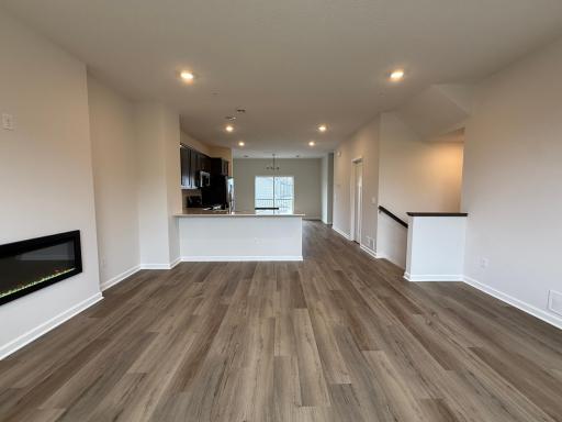 In this open floor plan, the dinette, kitchen, and living room flow flawlessly to keep everyone connected.