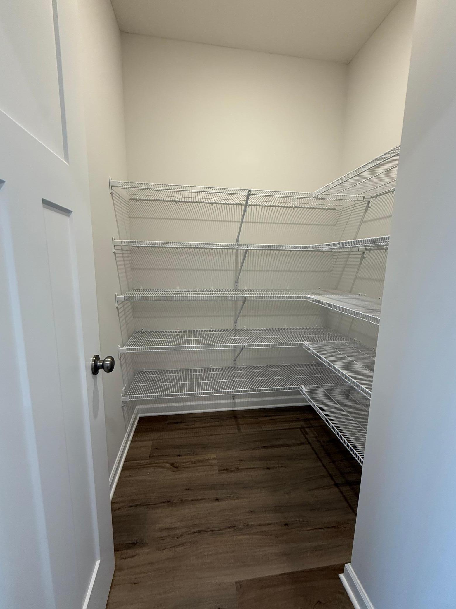 A massive pantry featuring 5 racks allows for maximum storage.