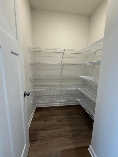 A massive pantry featuring 5 racks allows for maximum storage.