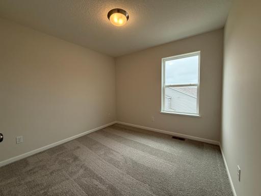 The secondary bedrooms are perfectly sized for everyone.