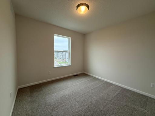 The secondary bedrooms are perfectly sized for everyone.