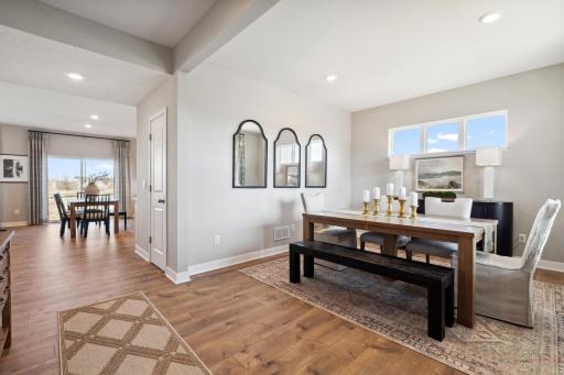 Formal dining space or could be music room or play room.