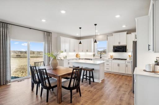 Kitchen and dinette spaces have enough room for everyone.