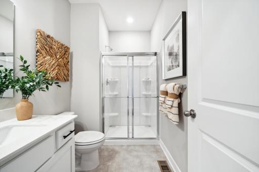 Main floor bathroom offers you long term options in your new home.