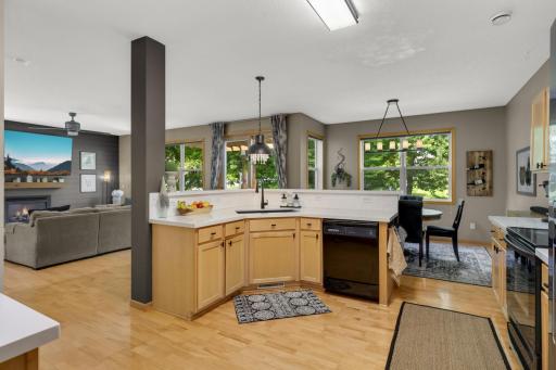 Kitchen features newer countertops and backsplash
