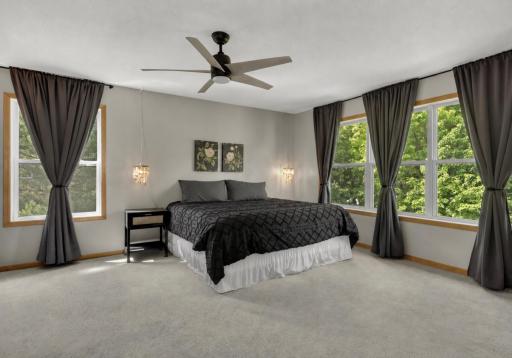 Spacious owner's suite with private bath and walk-in closet