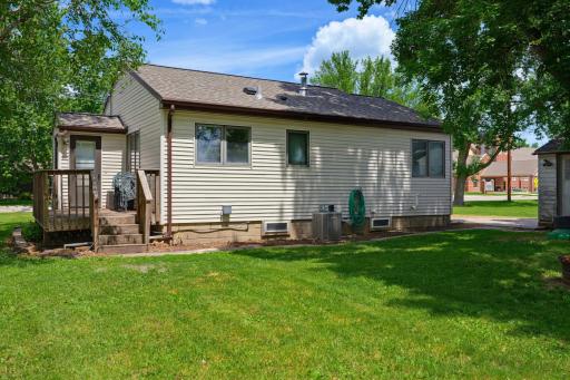 Another small deck is situated on the back of the home. Low maintenance vinyl siding is featured on the exterior.