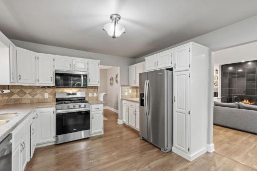 Easy flow into 2nd family room & dining room
