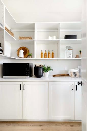 Amazing Morning Kitchen walk-in Pantry. Another Robert Thomas Home, Sold before Print ***Prices, square footage, Photos &/or illustrations may not depict actual home plan configuration.