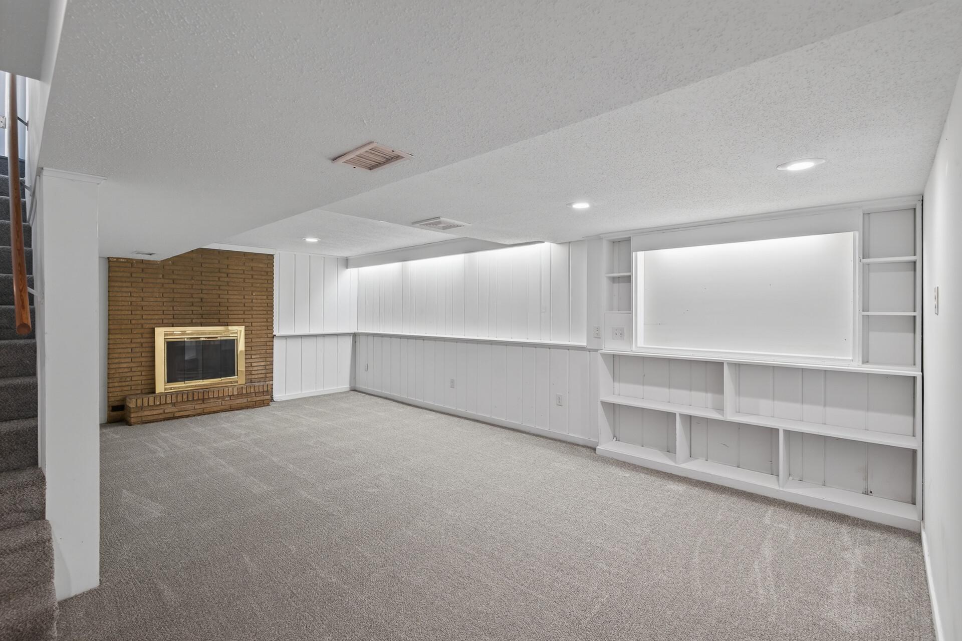 Lower level large family room with built ins!