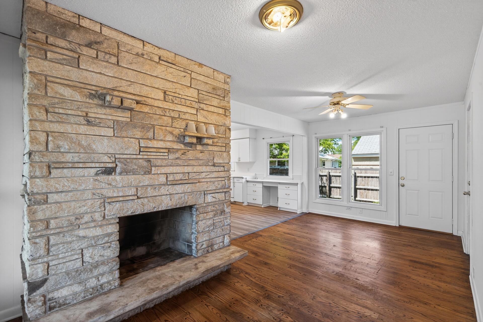 With a sitting area plus living room on the main level makes this floor plan unique. Use it as an additional sitting room or a large dining room area!